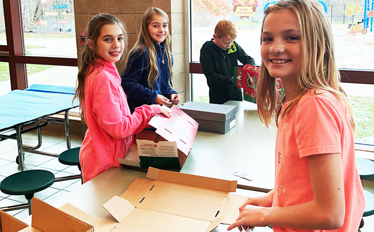 Volunteers of Oakwood filled shoeboxes for children in need all over the world.