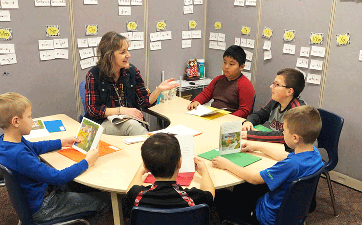 Teacher with students