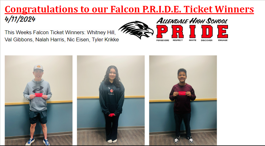 Picture of students holding their falcon tickets.